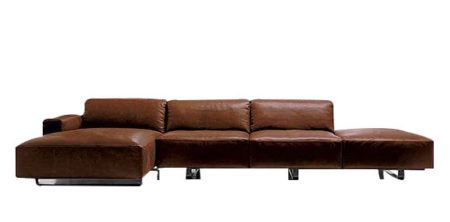 sofa de couro com chaise e puff para 3 pessoas