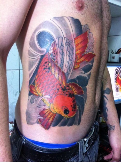 tatuagem carpa na barriga 1