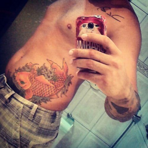 tatuagem carpa na barriga 2